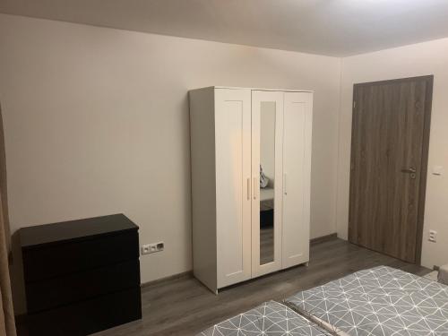 Postel nebo postele na pokoji v ubytování Penzion Fortuna Žatec