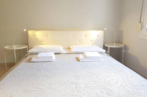 Giường trong phòng chung tại A Great Stay at a Comfortable Large Apartment