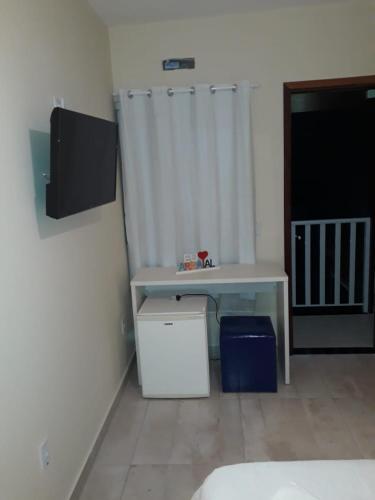Μια τηλεόραση ή/και κέντρο ψυχαγωγίας στο Pontal Praia Suítes