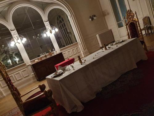 a large room with a long table in a building at Salon Boyer in Épernay