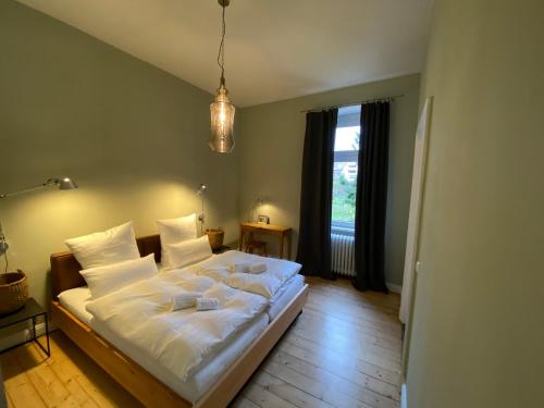 Postel nebo postele na pokoji v ubytování Fabelhaus