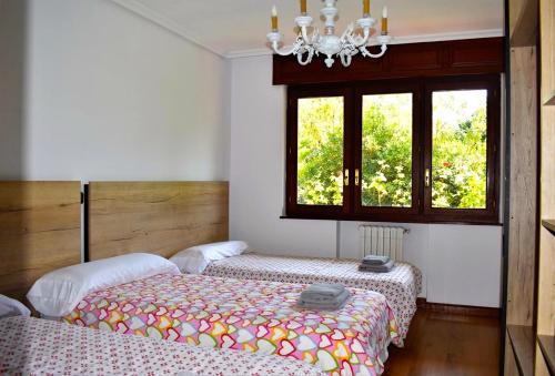 Ένα ή περισσότερα κρεβάτια σε δωμάτιο στο Casa Camelia