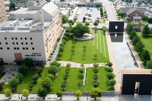 an aerial view of a building with a park at Holiday Inn Express & Suites Oklahoma City Downtown - Bricktown by IHG in Oklahoma City