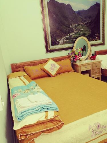 Katil atau katil-katil dalam bilik di Hotel Thien An