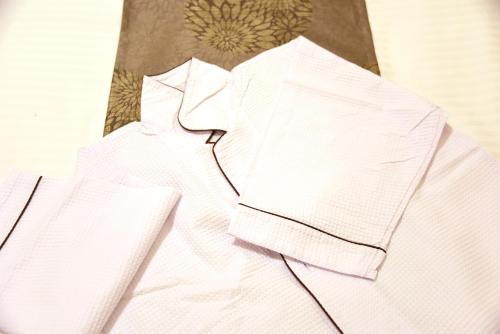 a close up of a white shirt with a napkin at Hotel Sankyo Fukushima in Fukushima