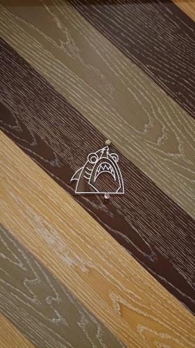 a drawing of a diamond on a wooden table at Shark B&B in Hengchun