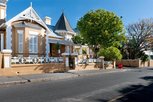 a house on the side of a street at Ashanti Gardens Guesthouse in Cape Town