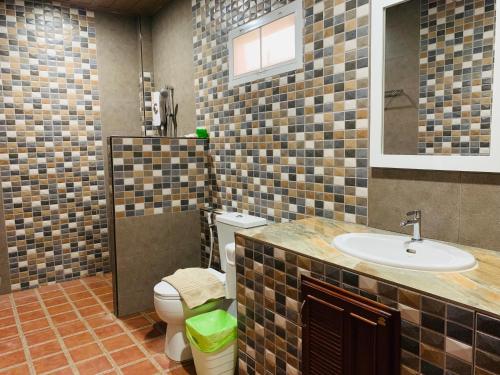 Koupelna v ubytování Benwadee Resort Pattaya