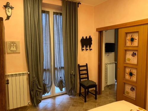 Ένα ή περισσότερα κρεβάτια σε δωμάτιο στο Casa Friends Lingotto Ospedali Metro Spezia