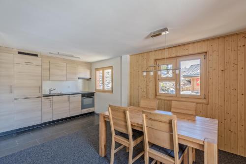 Kuchyň nebo kuchyňský kout v ubytování Chalet Krokus