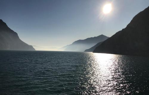 a large body of water with mountains in the background at Casa Marconi in Lovere