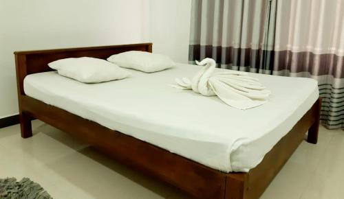 Postel nebo postele na pokoji v ubytování Kanora lake resort