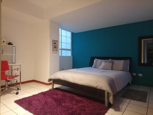 Postel nebo postele na pokoji v ubytování Naths Apartment
