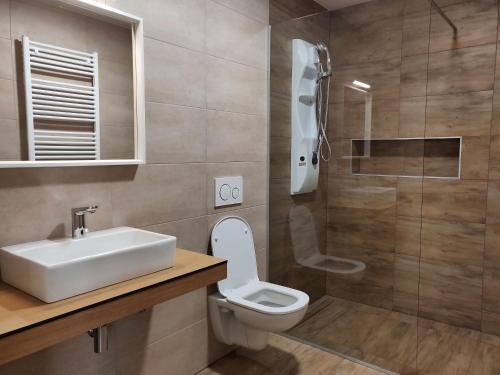 Ванна кімната в PUBYLAND ROOMS & APARTMENTS