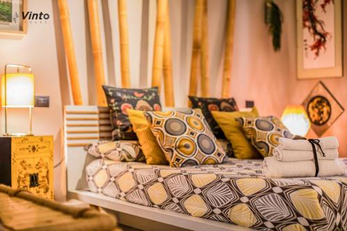 Ένα ή περισσότερα κρεβάτια σε δωμάτιο στο Vinto House Salerno Downtown