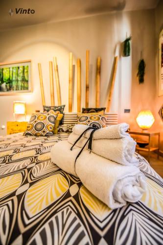 Ένα ή περισσότερα κρεβάτια σε δωμάτιο στο Vinto House Salerno Downtown