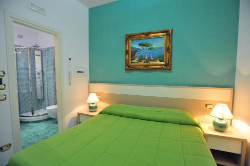 Säng eller sängar i ett rum på Villa Adriana Amalfi