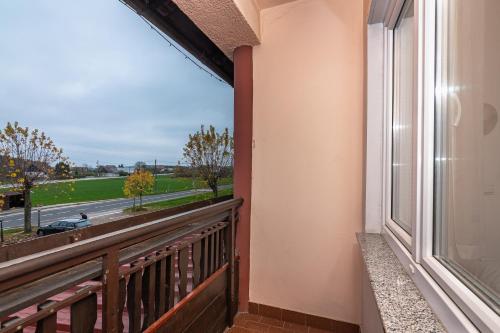 a balcony with a view of a street at Gostisce Golob in Zgornja Polskava