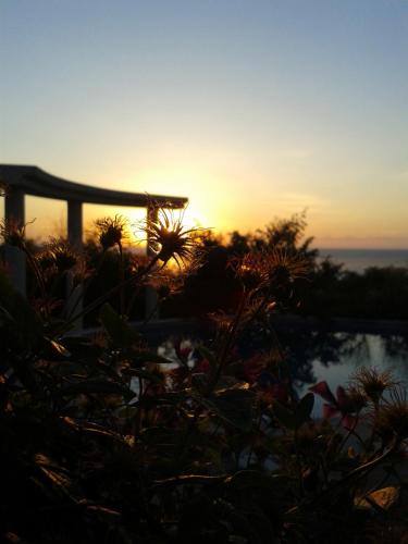 a sunset from the backyard of a house at Villa Sky Music in Obzor