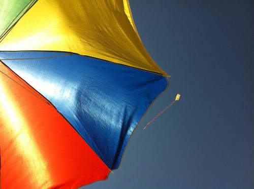 a colorful umbrella flying in the sky at Villa Sky Music in Obzor