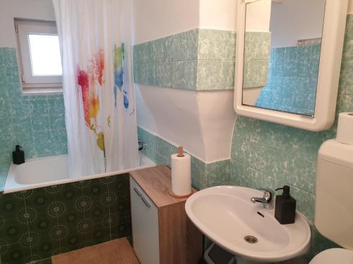 Ванна кімната в Sašo Rooms & Apartments