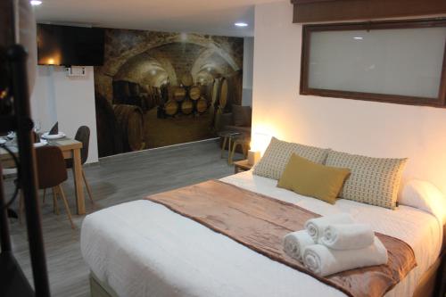 A bed or beds in a room at Loft Turístico en casco histórico, Wifi y TV satélite gratis