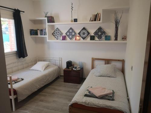 En eller flere senge i et værelse på Madrid Green