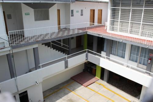 an overhead view of a building with two balconies at Hotel Juarez in Cuernavaca