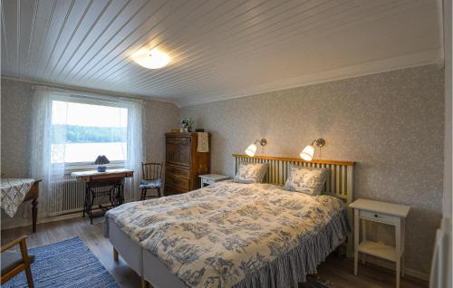 Ένα ή περισσότερα κρεβάτια σε δωμάτιο στο Nice Home In rjng With Wifi