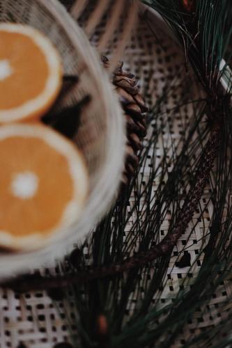 a plate of orange slices on a table at The Twelve Manor•Terraces Lodge in Yuanyang