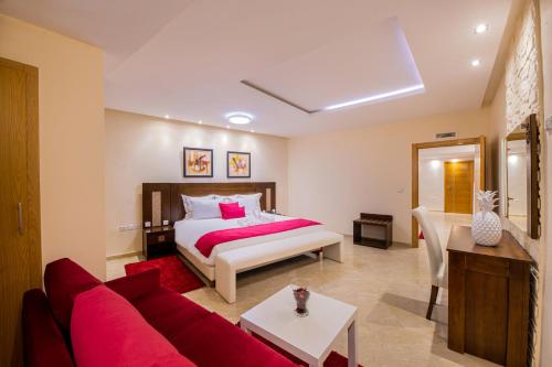 Un ou plusieurs lits dans un hébergement de l'établissement Marrakech Inn Appart-hotel & Pool