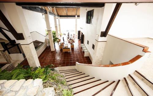 a view from the top of a building with stairs at Emoha Dive Resort in Oslob