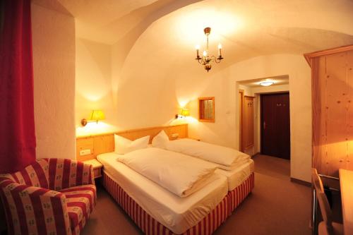 Postel nebo postele na pokoji v ubytování Hotel Krone