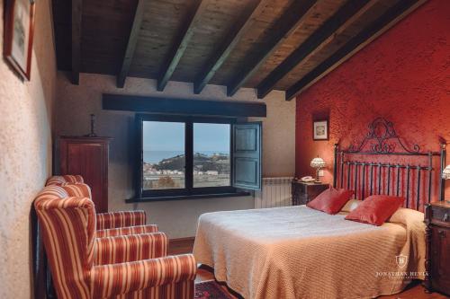 Кровать или кровати в номере Paraje del Asturcon - Adults only