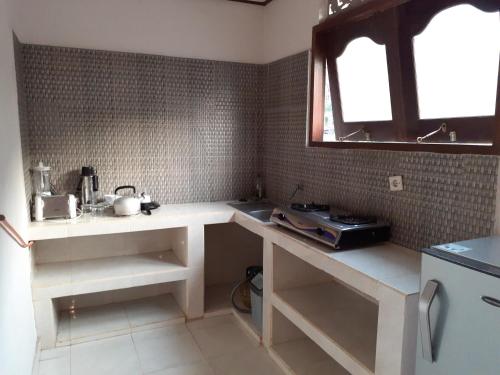 Η κουζίνα ή μικρή κουζίνα στο Double One Villas Amed II