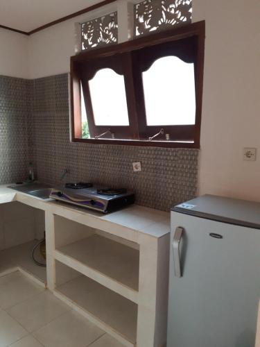 Η κουζίνα ή μικρή κουζίνα στο Double One Villas Amed II