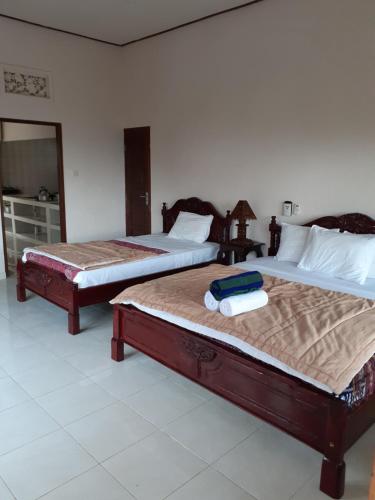Ένα ή περισσότερα κρεβάτια σε δωμάτιο στο Double One Villas Amed II