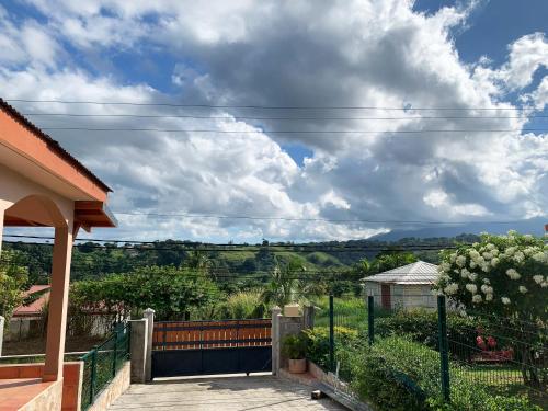 a view from the porch of a house at Le ZANDOLI (Appartement avec vue) in Petit-Bourg