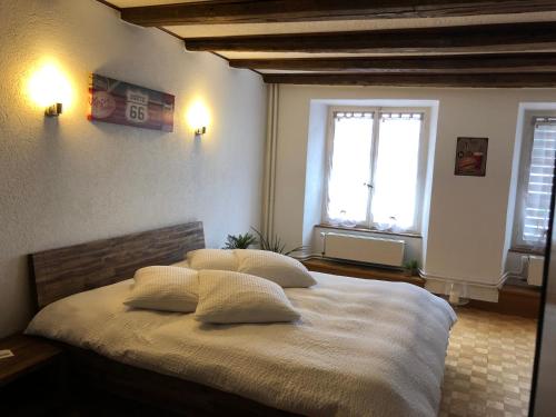 Postel nebo postele na pokoji v ubytování Appart'Hôtel HG