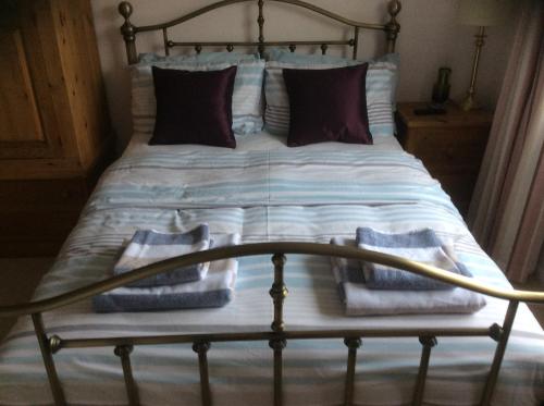 Ліжко або ліжка в номері Bub Lane Cottage