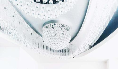 a close up of a white ceiling at Sun Hotel in Tokyo