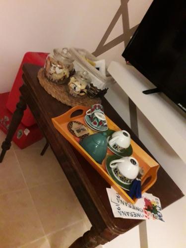 a table with some figurines on top of it at Nenet in Guglionesi