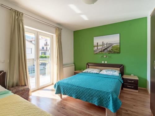 Ένα ή περισσότερα κρεβάτια σε δωμάτιο στο Apartment Kate-3 by Interhome