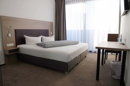 Hotel New Inにあるベッド
