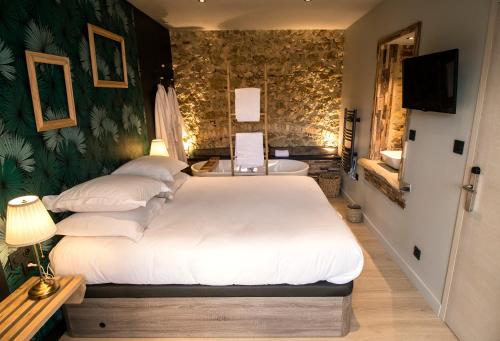 Katil atau katil-katil dalam bilik di Chez Gisèle Gîte de prestige à Samer