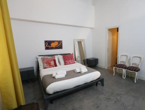 Ένα ή περισσότερα κρεβάτια σε δωμάτιο στο B&B Salerno al Duomo