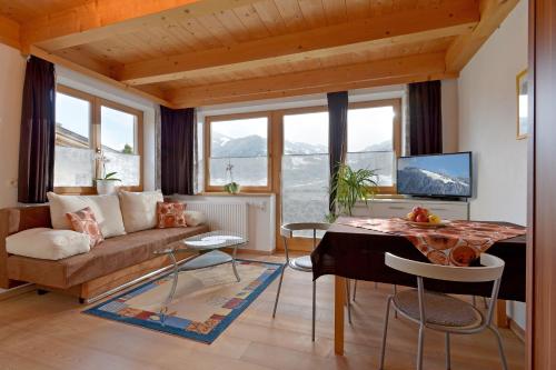 A seating area at Appartements Alpenblick Söll