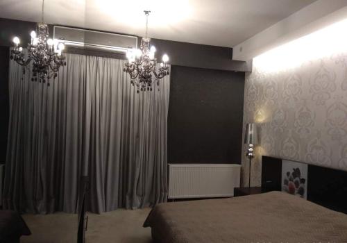 Postel nebo postele na pokoji v ubytování Hotel Cezaria