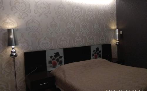 Postel nebo postele na pokoji v ubytování Hotel Cezaria