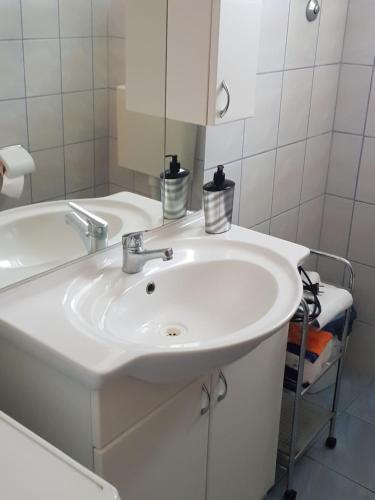 Kúpeľňa v ubytovaní Apartments Maček